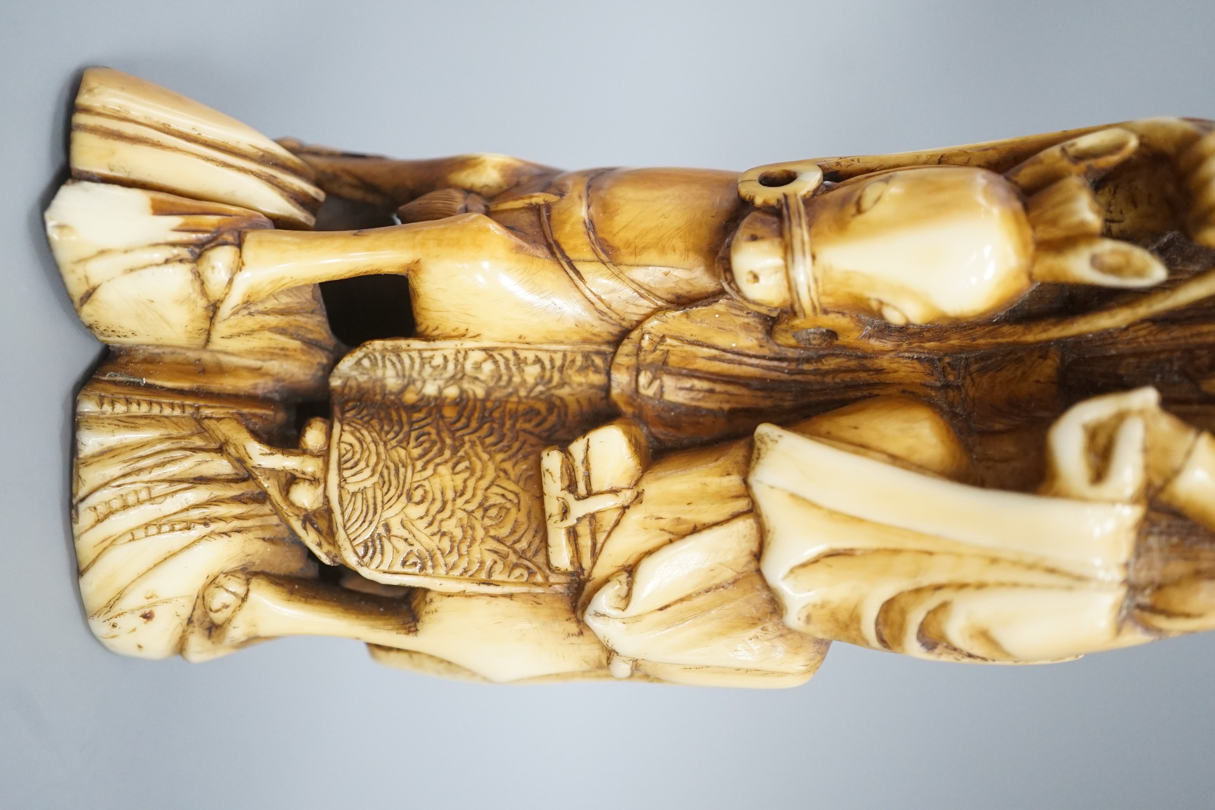 A Chinese hippopotamus ivory group of Zhang Guolao riding a horse, 19th century 14cm